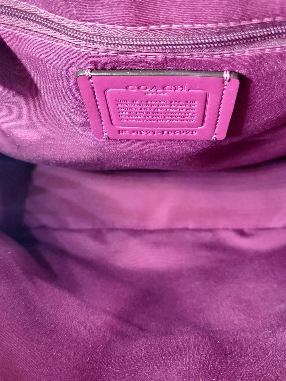 COACH JORDYN BACKPACK IN SIGNATURE CANVAS METALLIC BERRY/BROWN